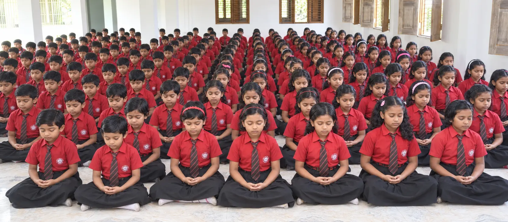 Ananda Marga schoolchildren meditating together