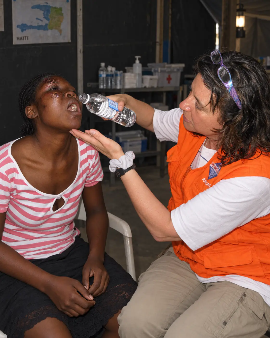 An AMURTEL health worker providing care during relief work in Haiti